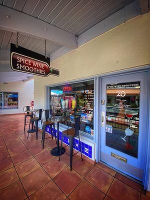 Front sign and entrance with outdoor seating