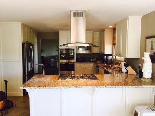 Removed downdraft and installed new cooktop and hood as well as all new kitchen appliances