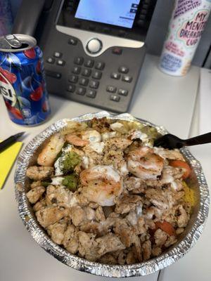 The menu is huge so I decided to go with something simple. The chicken and shrimp rice bowl with white sauce and vegetables was delicious!