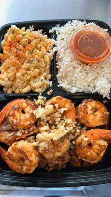 Hawiian surf & turf - white rice , hawiian Mac , rib eye steak , garlic prawns $30