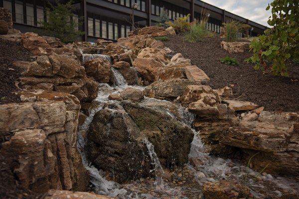Large natural looking waterfall.