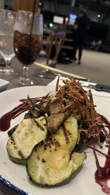 Grilled ribeye- center cut, smoked goat cheese, fried potato, surinam cherry demi-glace & garden vegetables