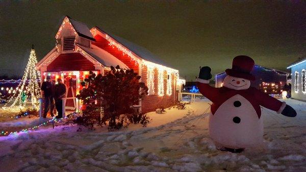Holiday in Lights at the Anoka County Fair: the old schoolhouse and newer snowfriend