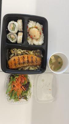 $15 bento with salmon teriyaki, and California rolls. Comes with soup, salad, rice and Korean marinaded egg