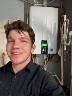 Our technician Daniel setting the standard with this pristine tankless water heater installation.
