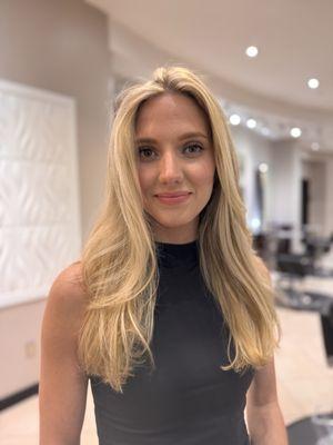 Highlighted with long layered haircut.