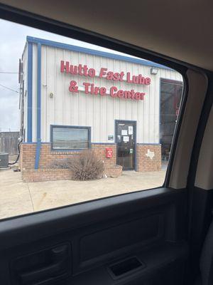 Hutto Fast Lube is easy to spot-they are on Front Street, right by the high school.