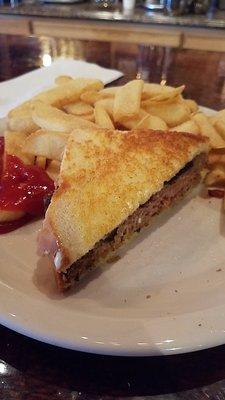 Meatloaf sandwich with steak fries