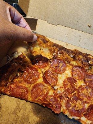 Pizza falling apart and stuck to the box, also very burnt pretzel crust!