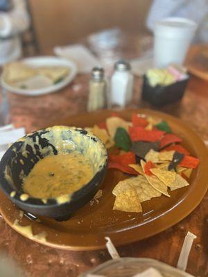 Queso. I'm a queso snob, and their queso was delicious. They served it with homemade flour chips.