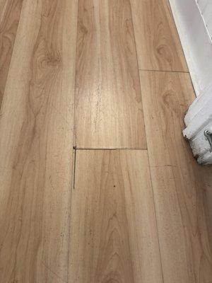 After one year of installation lamination cracked and separated in entry way .