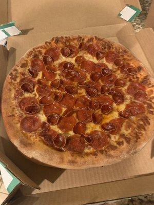 Pepperoni Magnifico Pizza but we forgot to slice it and the delicious romesan seasoning is missing. Still tasted delicious.