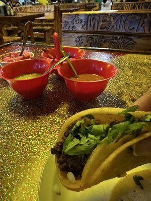 Delicious carne asada tacos ! Carful cause the hot sauces were crazy hot . Tasty but hot as hell!