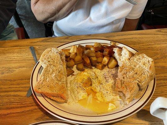Eggs & homemade whole wheat bread with home fries