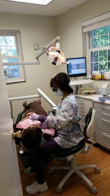 Our hygienist Vicky is busy checking and polishing your pearly whites.