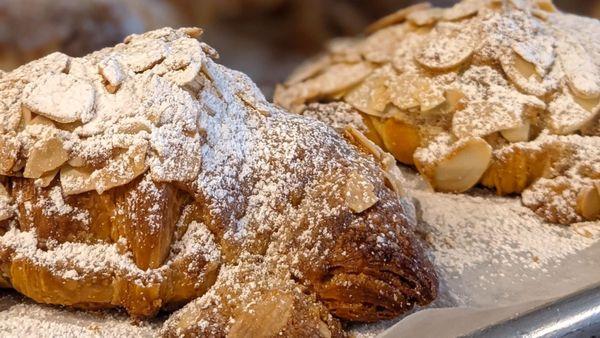 Almond Croissant dusted in Powdered Sugar