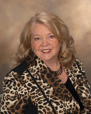 Nancy Raddohl, Broker/Owner with 45 years of experience.