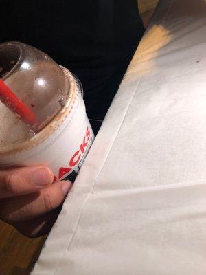 The hair on the milkshake