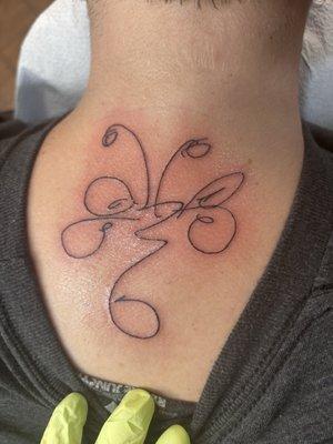 Dragonfly tattoo my Mother drew.