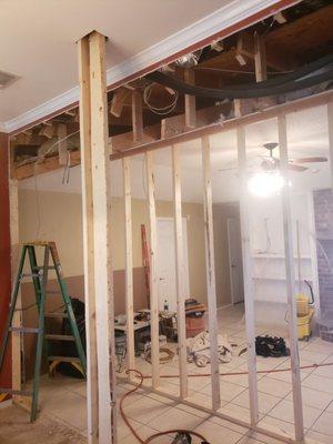 T-Brace is carrying the living room ceiling (using the ceilings strongback)