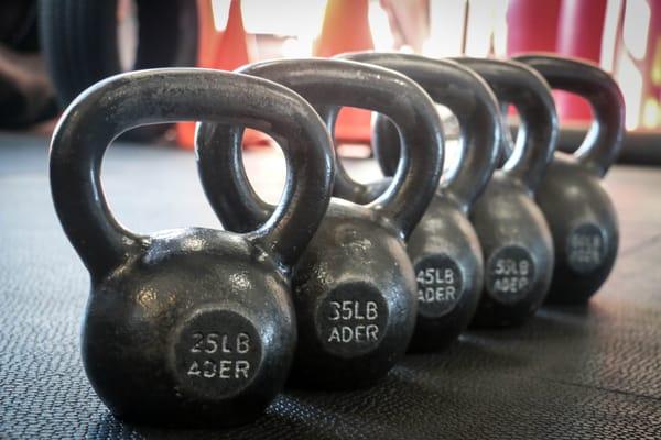 try a kettlebell classes with Empowered Performance Strength and Conditioning to change up your exercise routine.