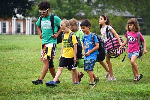 A counselor with his campers