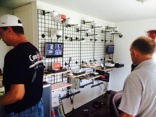 Installing cameras in our new showroom.
