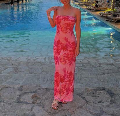 A dress that they completed an alteration for. You'd never know this dress was once waaaaay to long for me