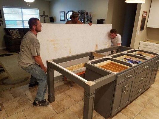 Installers came with an extra person for largest piece. They had the right gear to lift safely. Great Job.