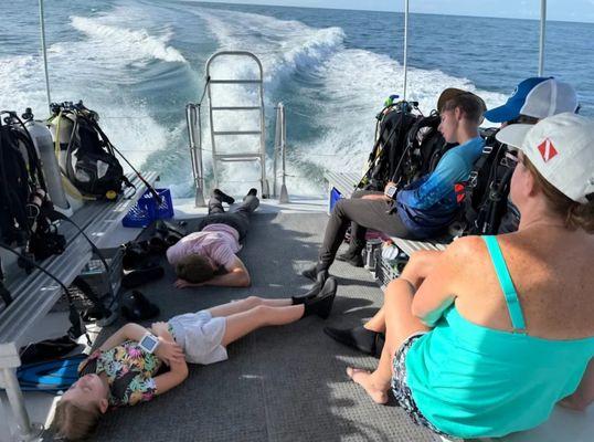 you know it was a great day when the kiddos are sleeping on the ride back in after diving. We have the spacious deck to do it too!