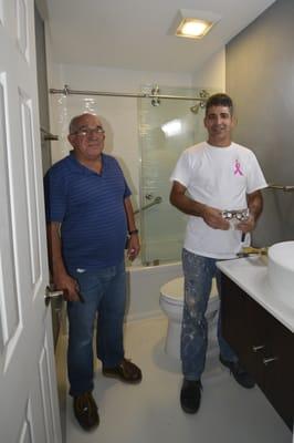 Andres & Toño at completion of Visitor's Bathroom