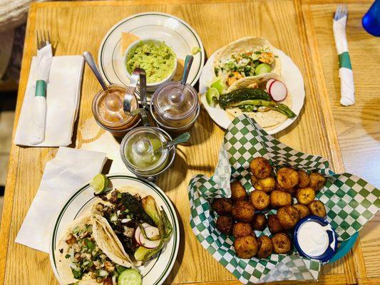 Tacos: chicken, carnitas, skrimp. Plantains. Guac. Assorted salsas, deliciousness