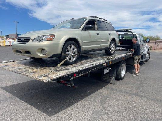 Business Owner Dean securing my prized 2006 Subie.