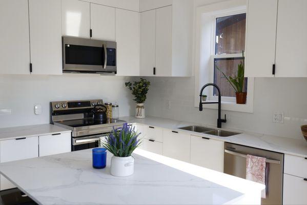 Olerra accessory dwelling unit (ADU) kitchen with all millwork, cabinetry, and appliances included