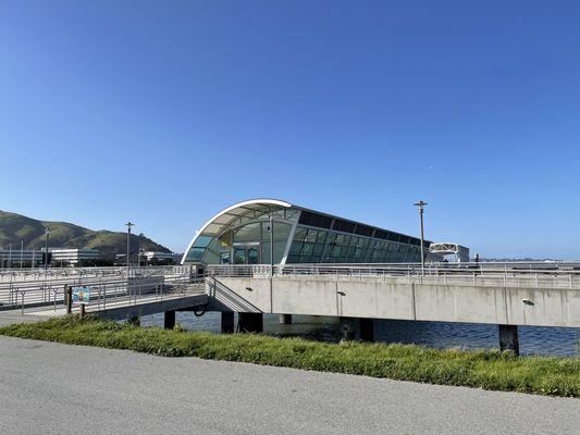 Long view of the dock and enclosed structure to board the ferry. The FERRY is behind this structure! I promise!