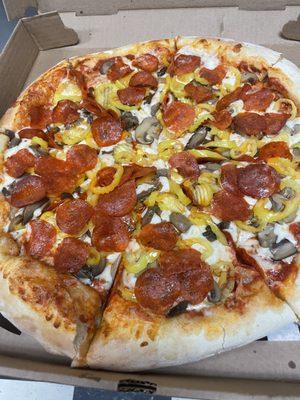 16 inch homemade pizza. Fresh dough and sauce.