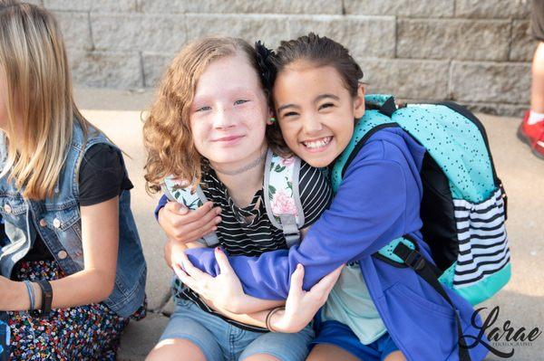 Hanging with friends during drop-off in the morning.
