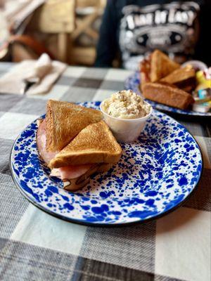 Club sandwich and potato salad