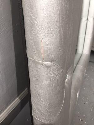 Rip in fabric on my mirror.