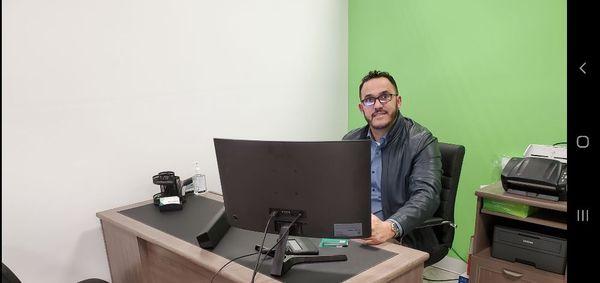 Alex Ochoa at the office