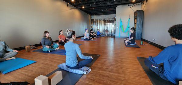 Pranayama and meditation during class.