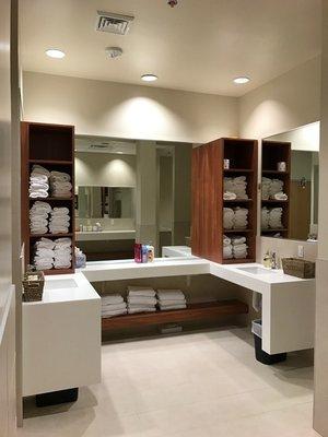 Locker Rooms with showers, complimentary towels, and sauna.