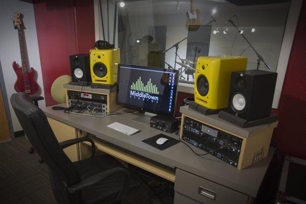 Professional audio studio services including recording, mixing, and mastering.