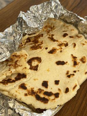Hand made, hand tossed tortillas, with small charred bits and a perfectly soft texture