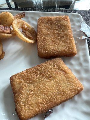 Pop tart like fish squares served for "fish & chips"