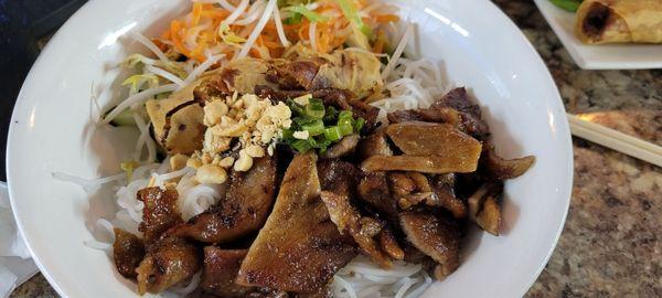 Grilled pork and eggrolls in vermicelli and fish sauce.