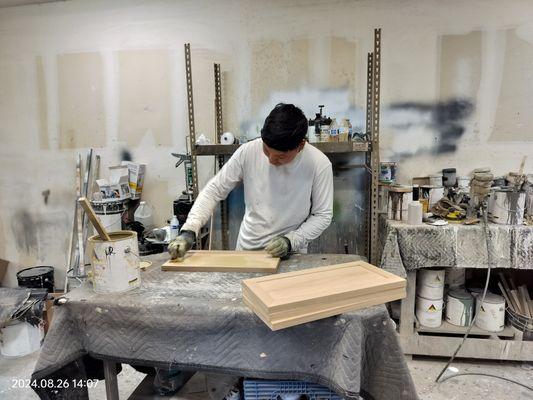 Staining the cabinets before they get put together!