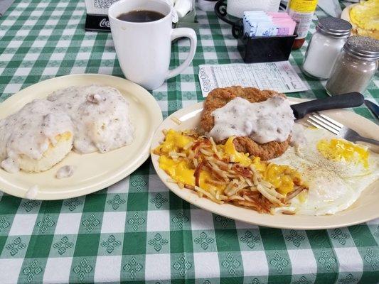 Country Fried Steak, 2 eggs, biscuits and gravy, and hashbrowns with onions and cheese