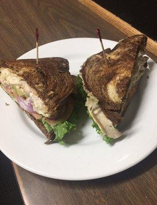 Have a special order? We'd be glad to make it for you! Here's a turkey and Swiss with tomato, onion, and lettuce sandwich.