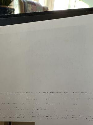 Right accross every page including the photos- In this case my father's face.